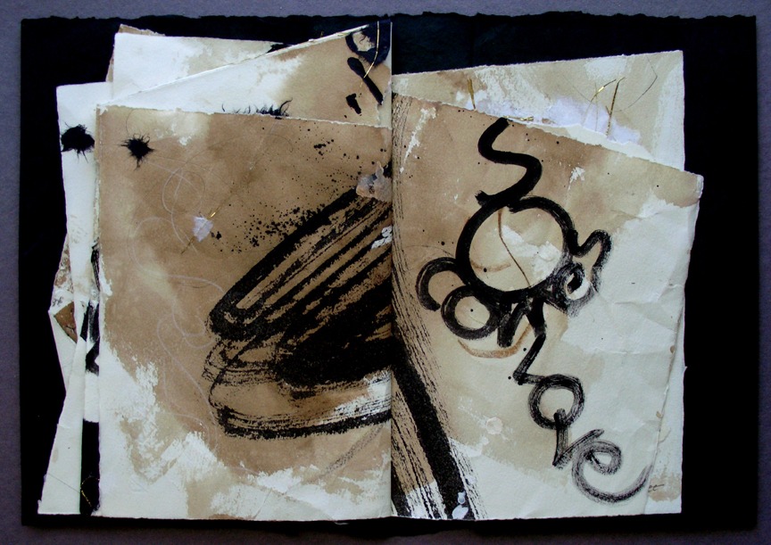 A textured collage of painted and sketched papers, featuring abstract designs in black and brown tones, with the word "love" prominently displayed.